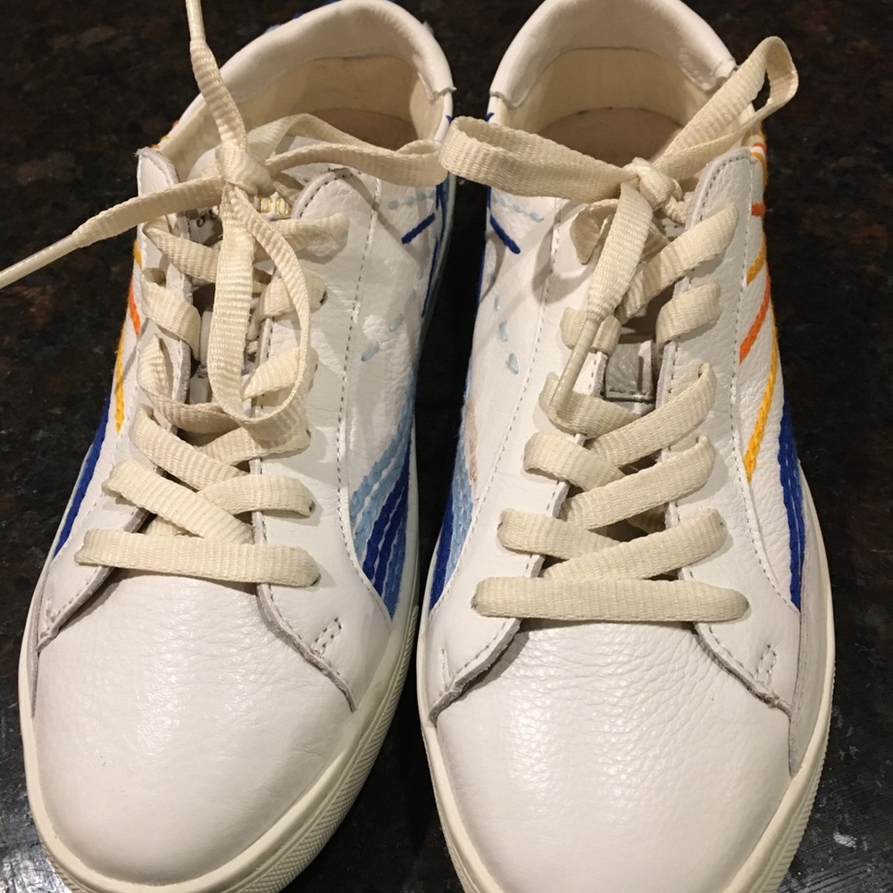 White Sneakers with Vibrant Stripes